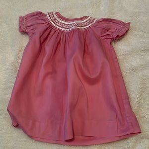Pink NB smocked dress with flowers